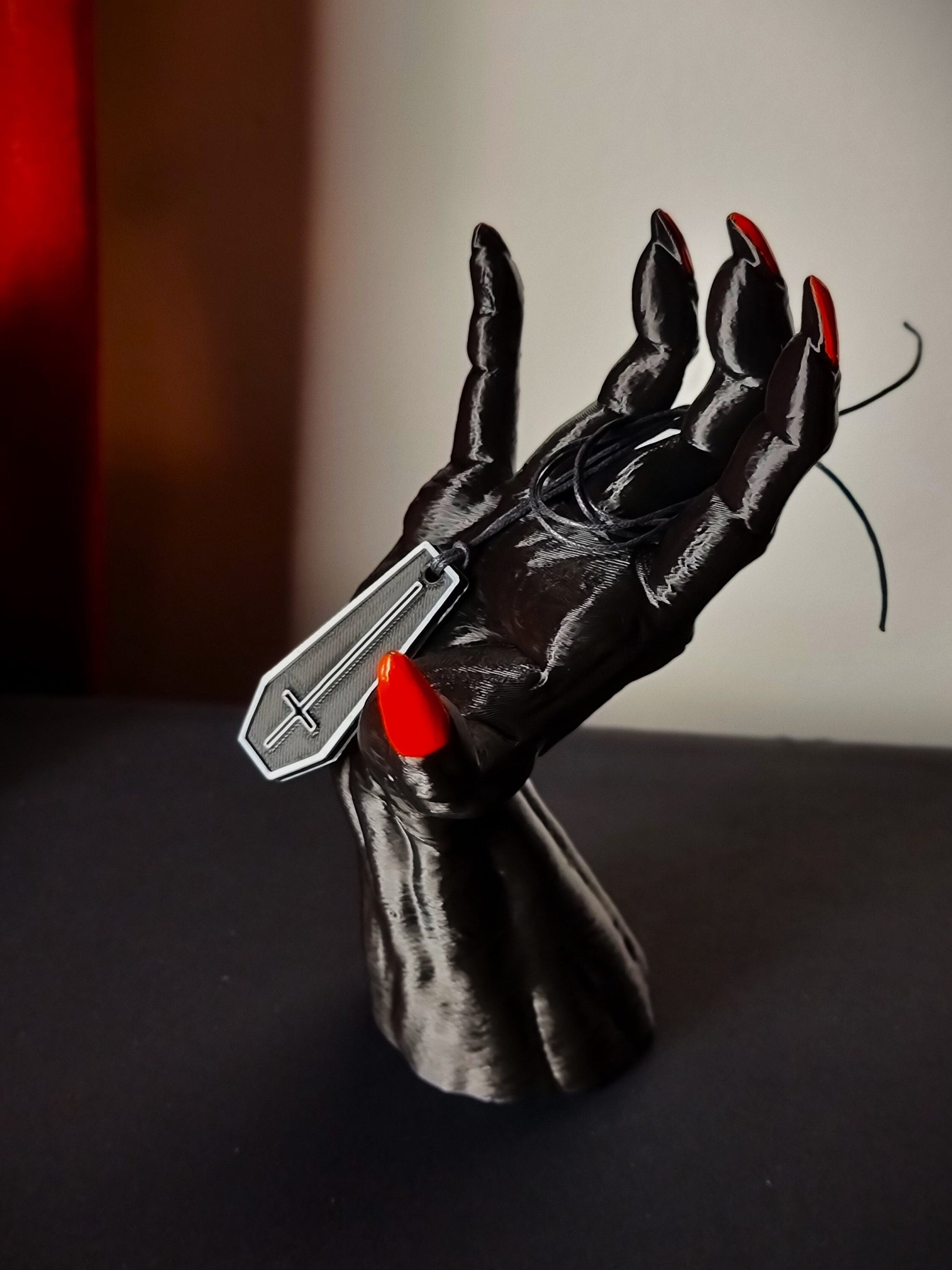 A large, life size and scary hand. Table or wall-mountable hand decoration that looks like it is reaching out to you!